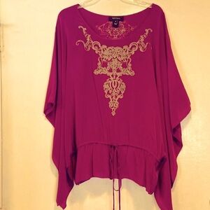 Karen Kane 100% silk, purple blouse. Unique design with intricate embroidery